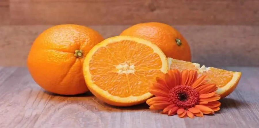 naranjas en fruteria blanco leon