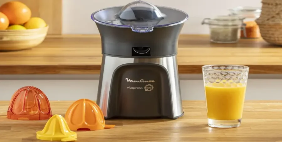 Moulinex Vitapress PC603D leon encima de una mesa